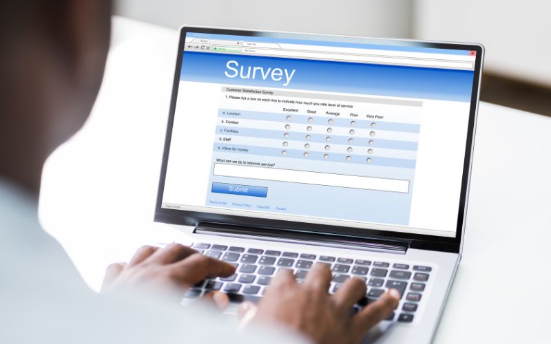 man filling online survey