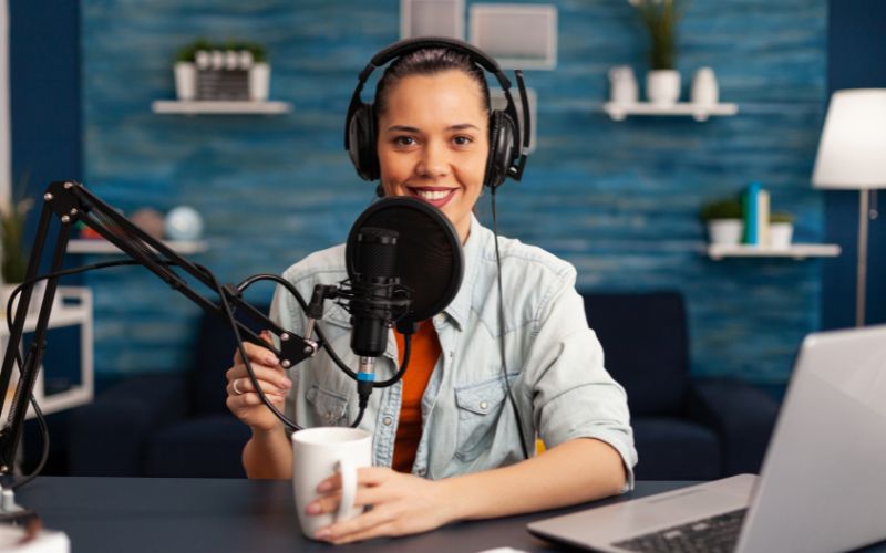 woman in podcasting setup